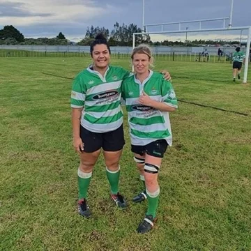 Nic and Lian playing rugby together